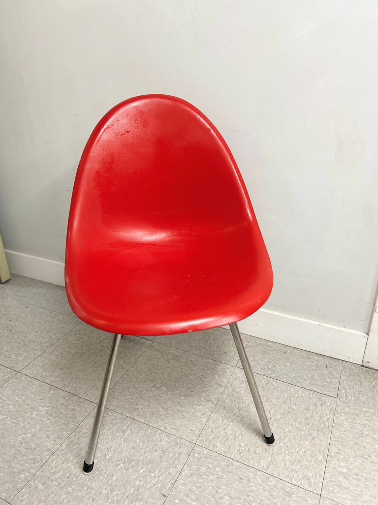 Red fibreglass chair