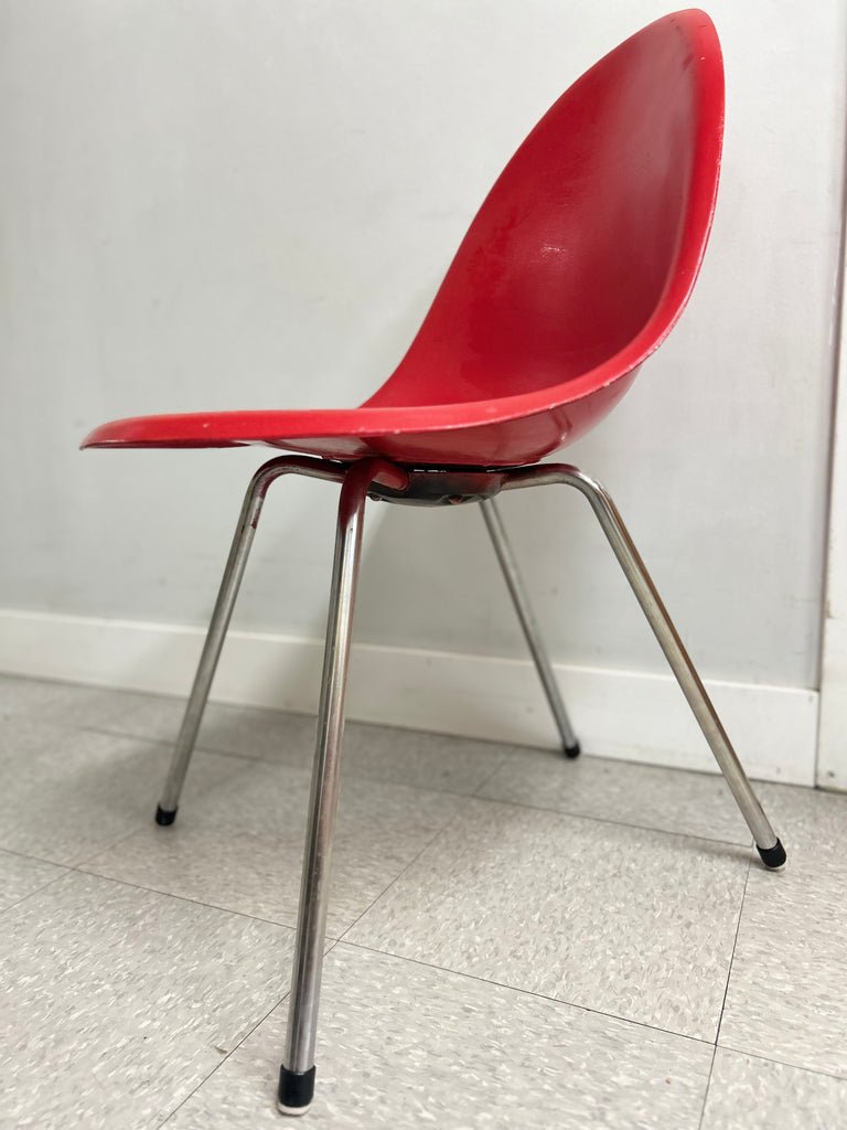 Red fibreglass chair