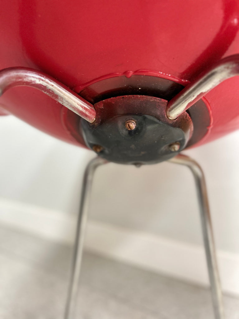 Red fibreglass chair