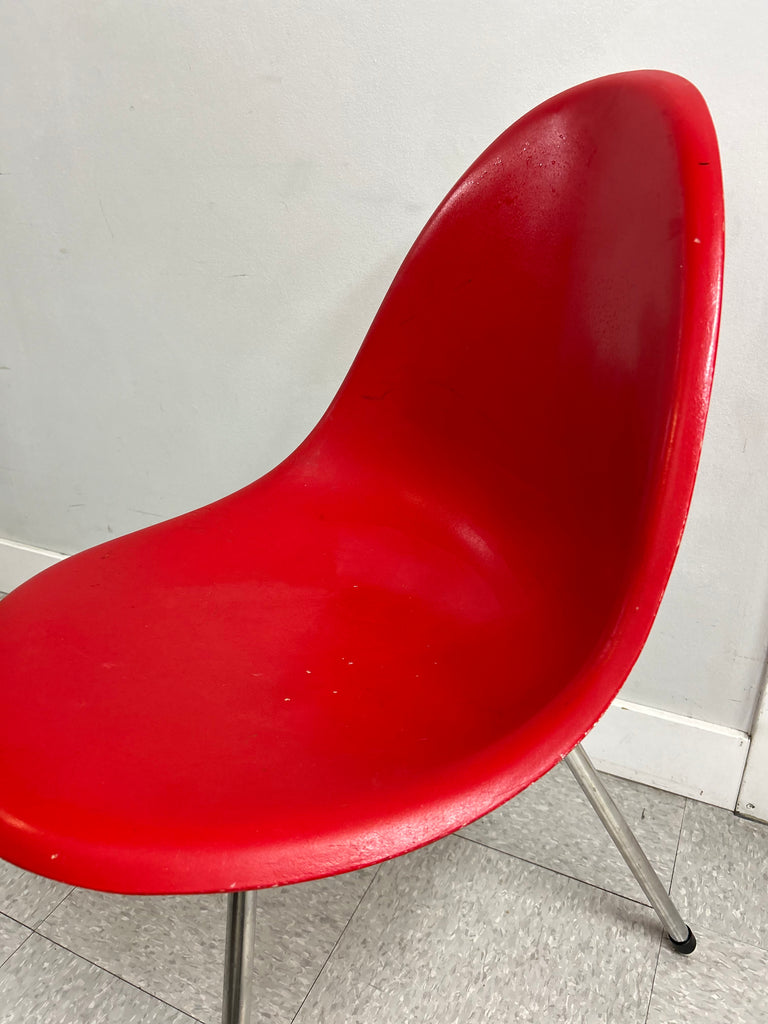 Red fibreglass chair