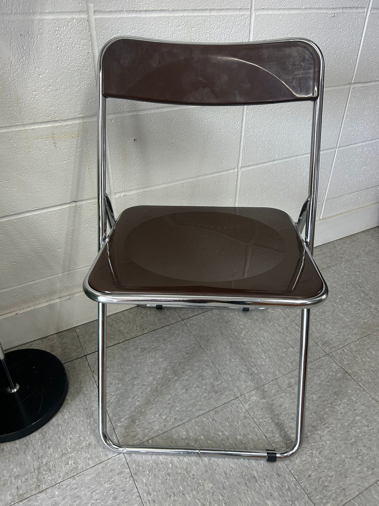 Fold up lucite chair